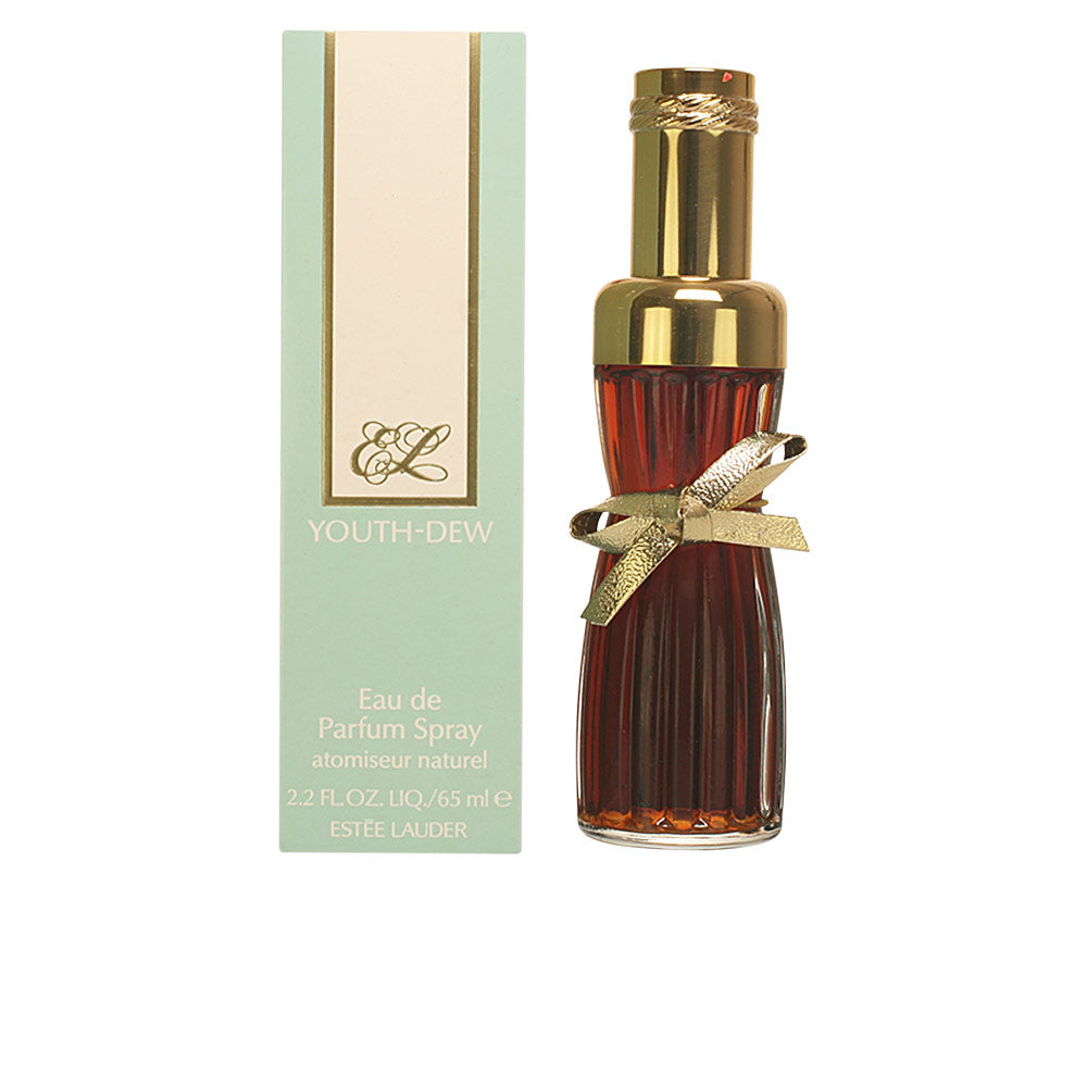 Estée Lauder Glass perfume bottle with ribbed amber body, gold cap and bow, seated by a beige and light-green box—Est