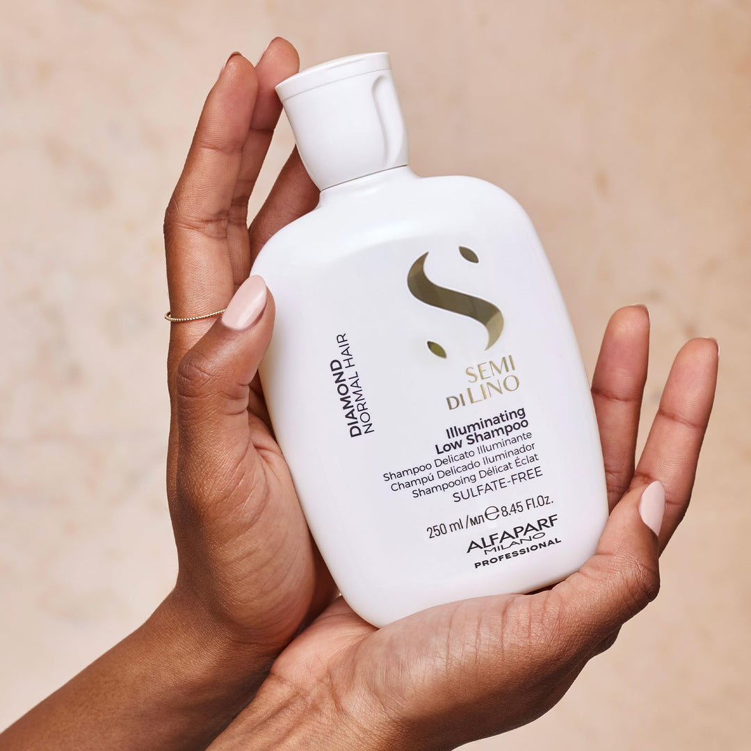 250 ml clear bottle of lightweight illuminating shampoo with argan and linseed