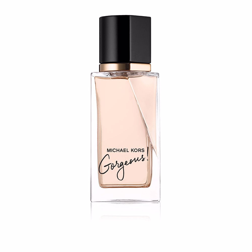 Glass perfume bottle with amber-coloured liquid and minimalist label, women&