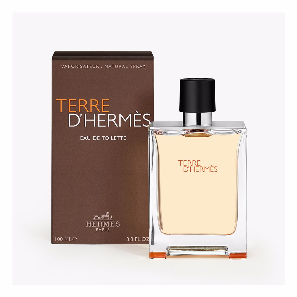Rectangular glass bottle with metal shoulders; 100 ml woody-citrus perfume for Man