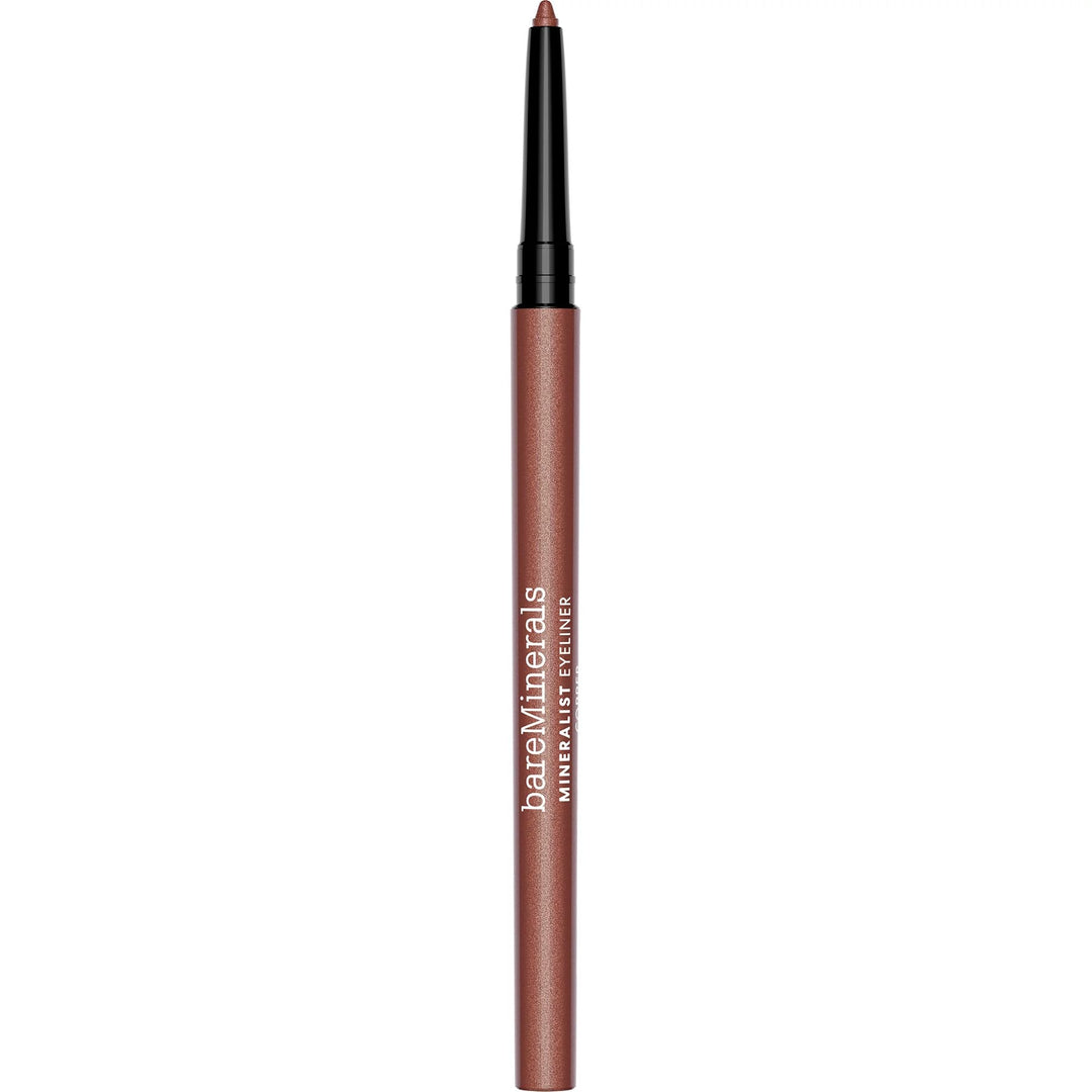 Copper-toned mineral eyeliner pencil with creamy tip and slim barrel, 0.35 g
