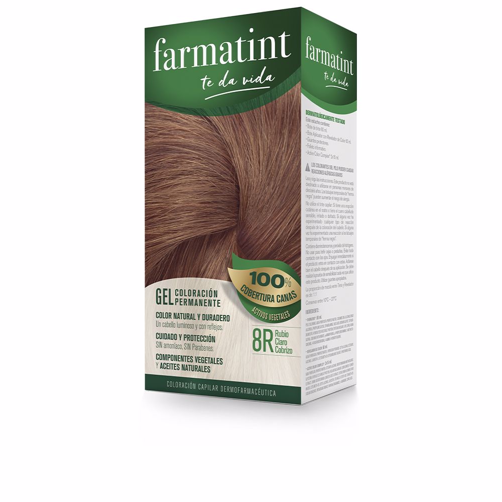 Tube and developer bottle of light copper blonde gel hair colour, plus two small after‑care vials