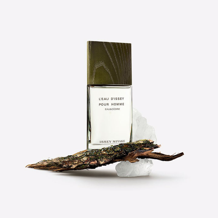 Minimal khaki 50 ml eau de toilette bottle with ash-wood cap, cedar-inspired scent