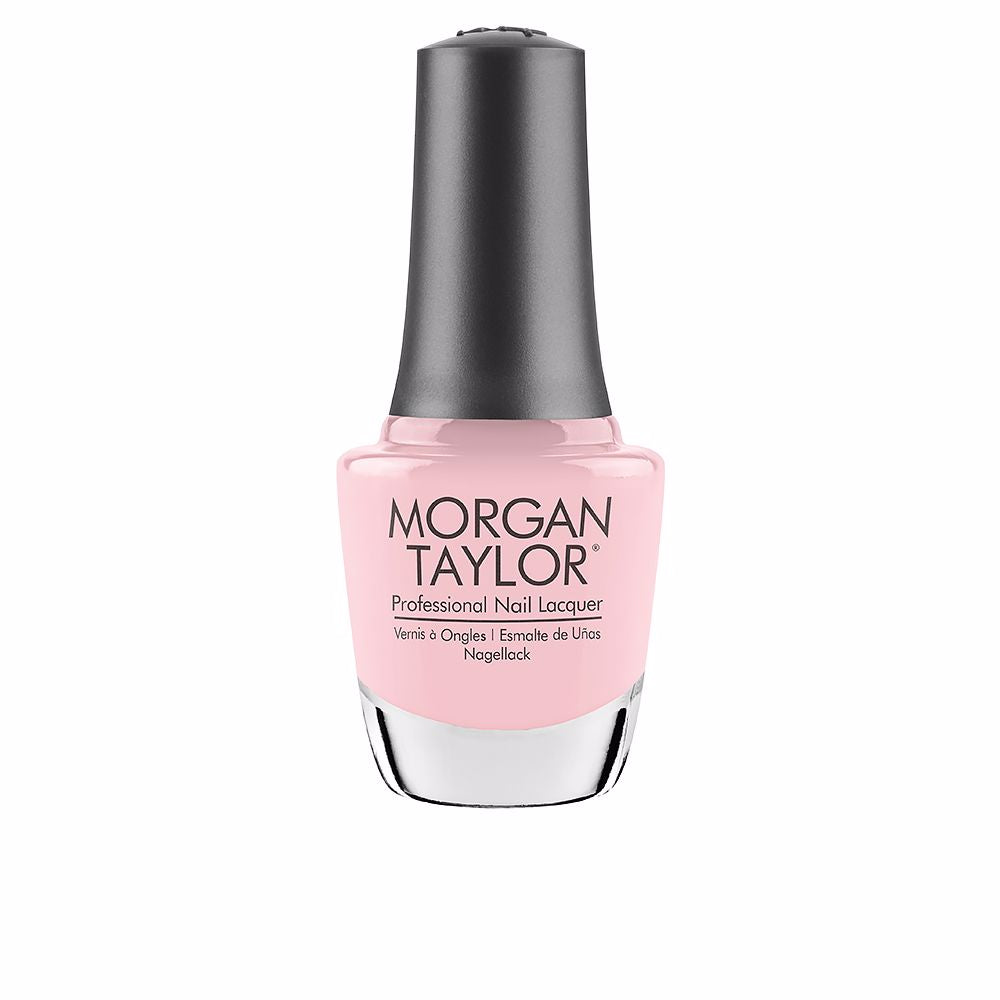 15 ml clear glass bottle of cream pink nail lacquer with curved brush