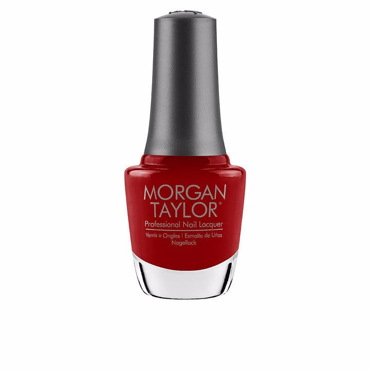 15 ml glass bottle of bold red nail lacquer with curved brush, glossy finish