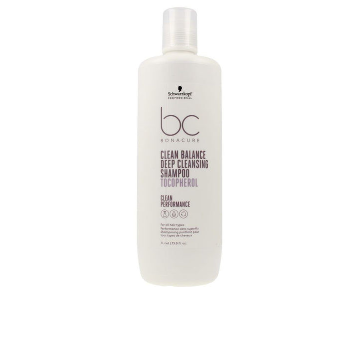 1,000 ml clear bottle of purifying shampoo labelled for deep cleansing, suitable for Women