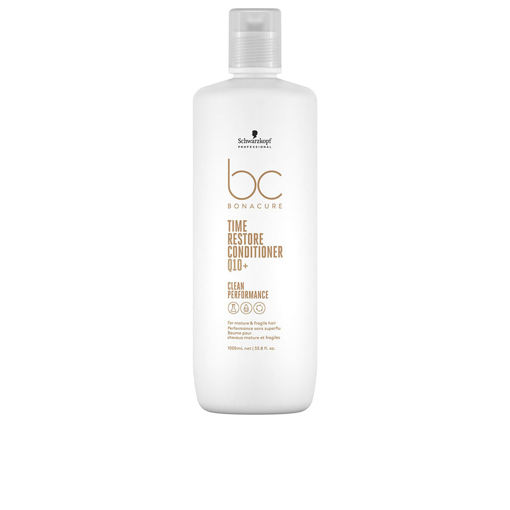 1,000 ml clear bottle of Q10 hydrating conditioner for mature hair, vegan formula