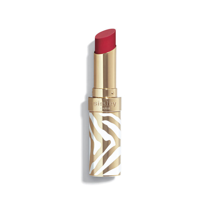 Rechargeable glossy lipstick in sheer red, zebra‑striped white and gold case, 3.4 g