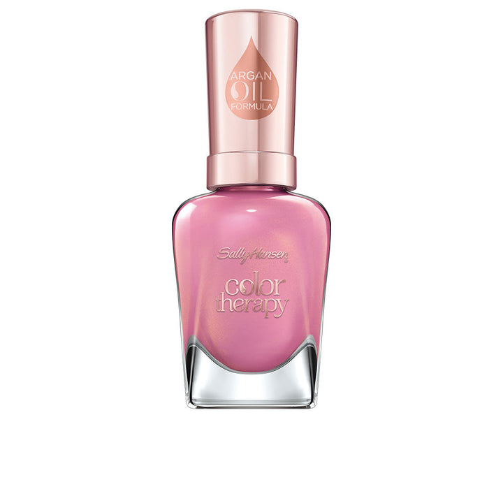 Bottle of mauve sheer nail polish, glossy finish, 14.7 ml
