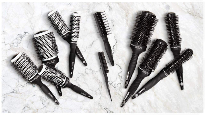 Concave 25 mm ceramic styling brush with waved nylon bristles for women