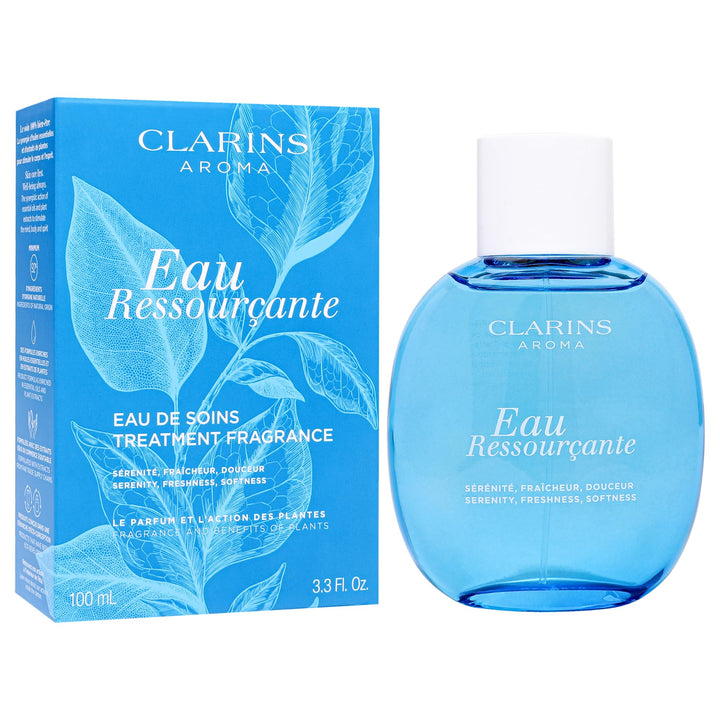 Dark blue elegant perfume bottle labeled Eau Ressourçante, floral-woody fragrance