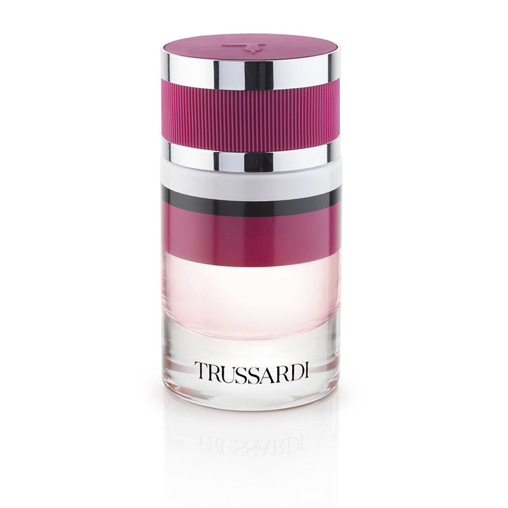 Glass perfume bottle with deep red liquid, gold-finish cap, 60 ml
