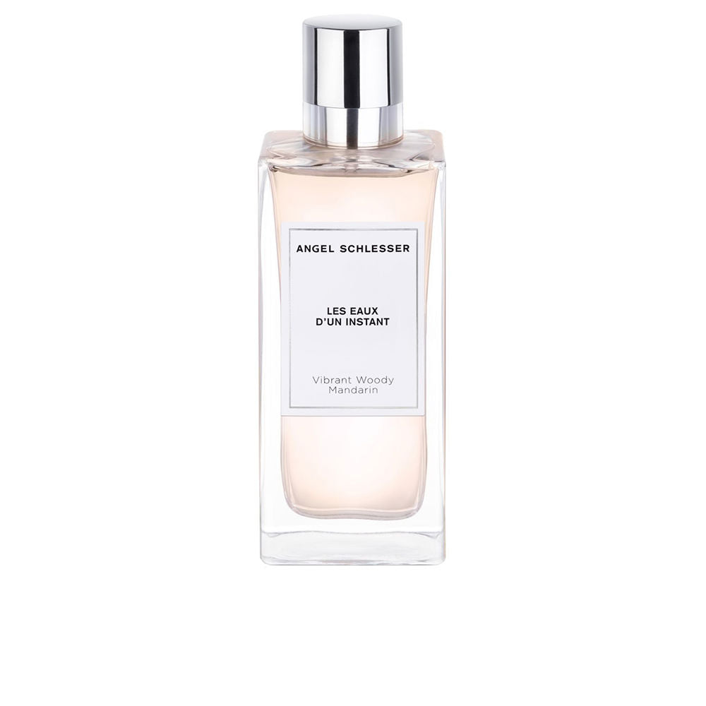 Clear glass bottle of Vibrant Woody Mandarin EDP, 100 ml, Unisex citrus-woody fragrance