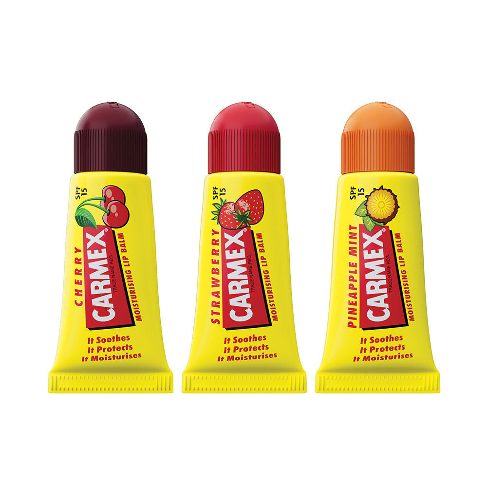 Three compact SPF 15 lip balm sticks in simple white tubes, travel-sized