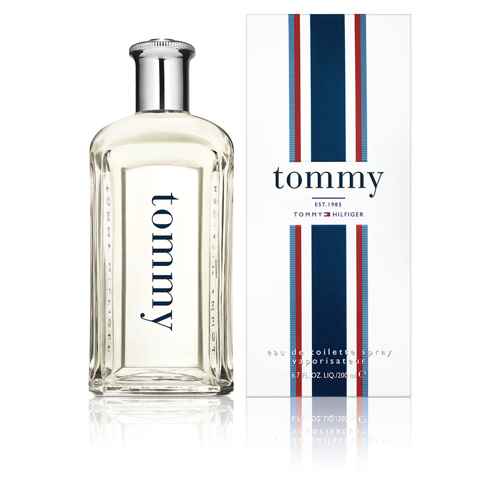 Clear sculpted bottle of woody-citrus Eau de Toilette, 100 ml, silver cap