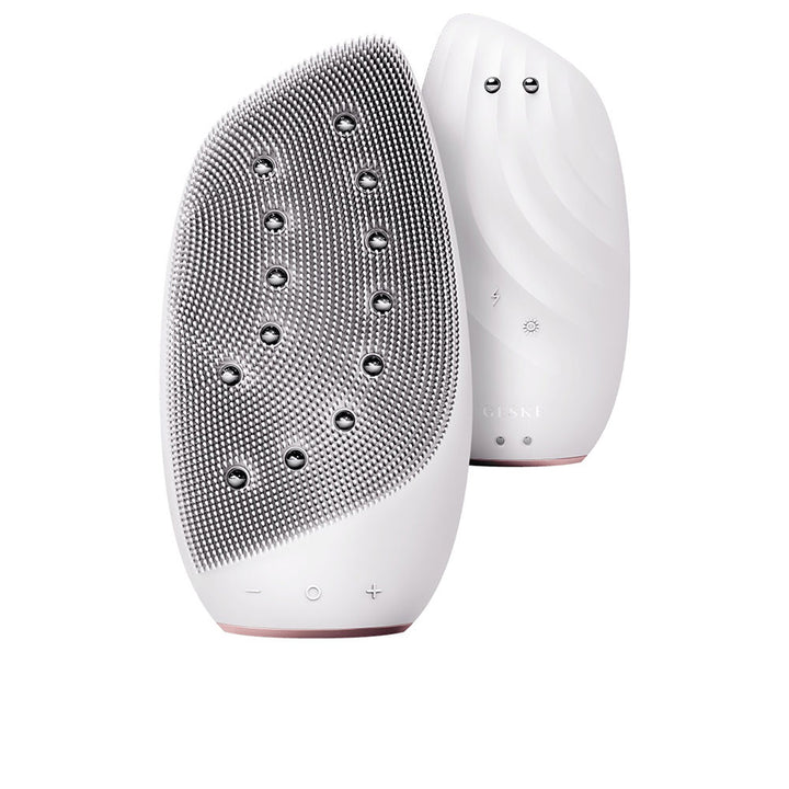 White 8-in-1 sonic thermo facial brush with warming pearls and interchangeable heads
