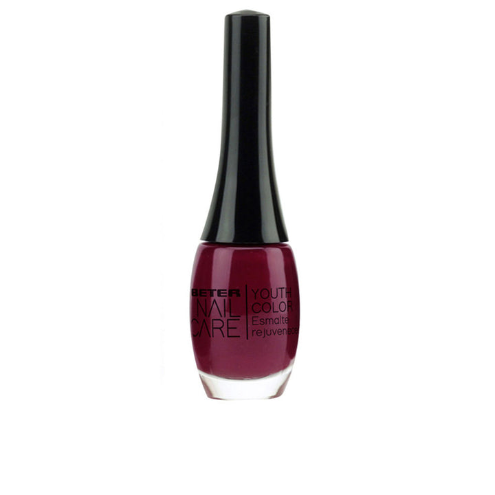 11 ml bottle of deep red nail polish with glossy finish, treatment lacquer