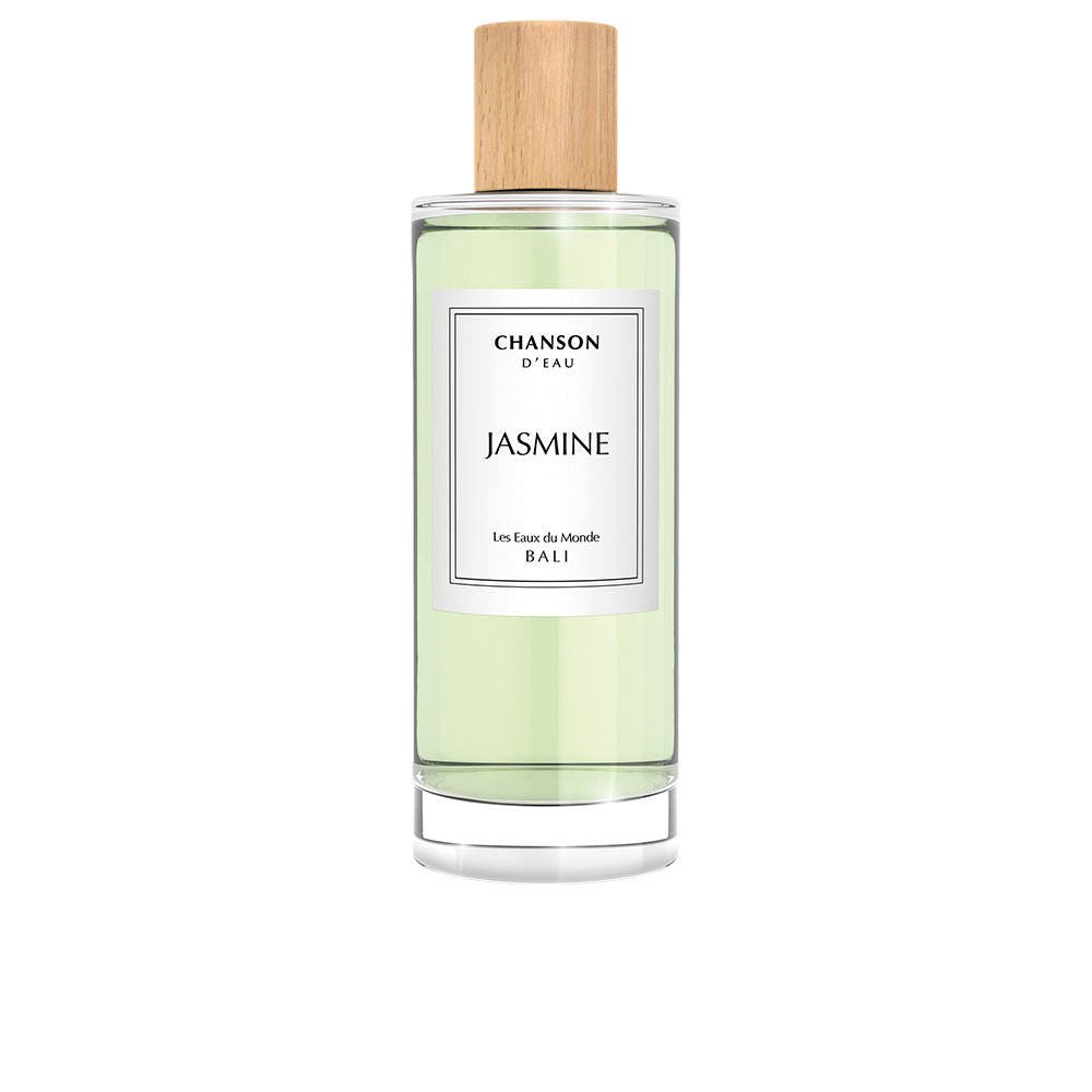 Chanson D'eau Light green glass cylindrical perfume bottle with wooden cap and simple text label, minimalist modern design from
