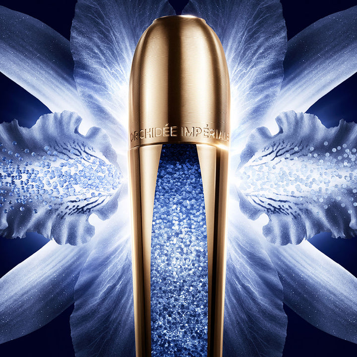 Elegant serum bottle of Orchidée Impériale Micro-Lift Concentrate by Guerlain