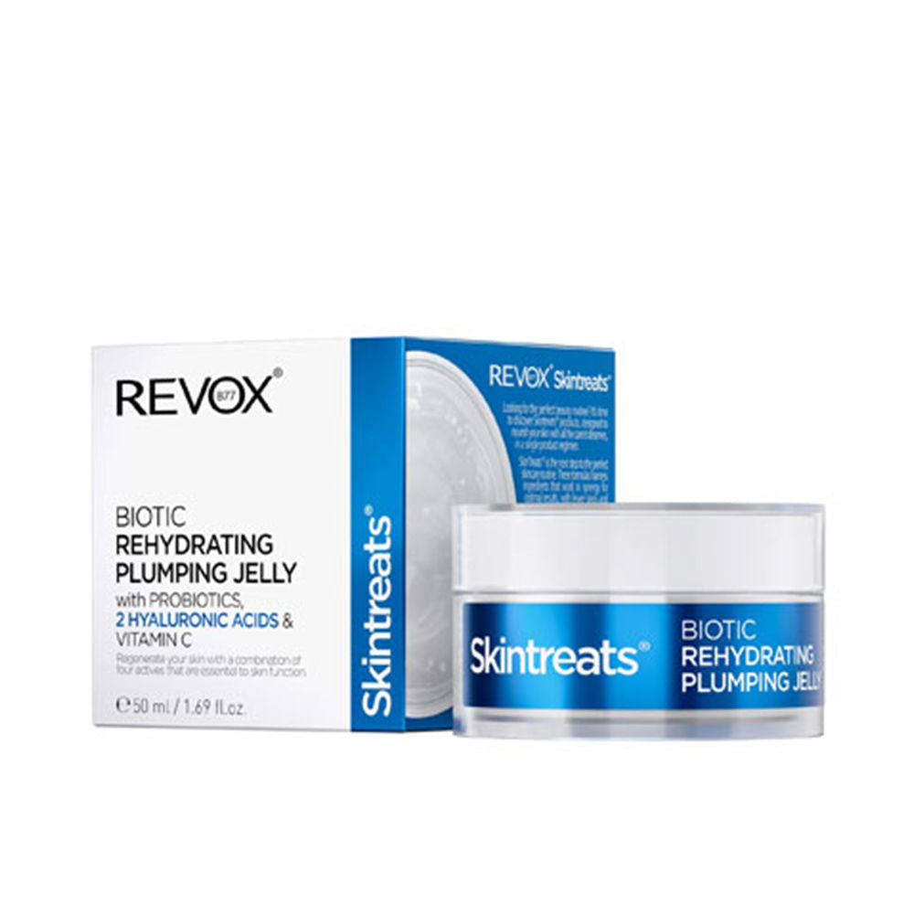 Revox B77 White-lidded plastic jar with blue band and labeled box, modern clean face cream presentation