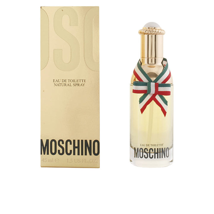 Tall glass Moschino perfume bottle with a decorative golden bow, elegant silhouette.