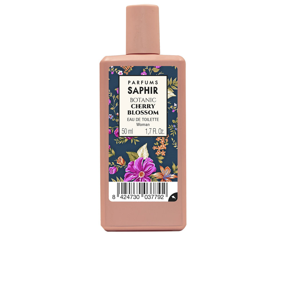 Pink rectangular plastic eau de toilette with floral label, screw cap and visible barcode — Parfums Saphir