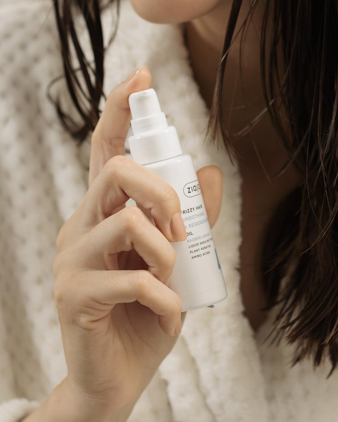50 ml clear pump bottle of smoothing hair oil with baobab and shea, Unisex
