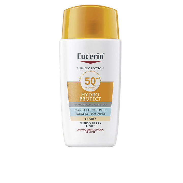 50 ml tinted ultra-light SPF 50+ facial fluid in slender bottle, light shade