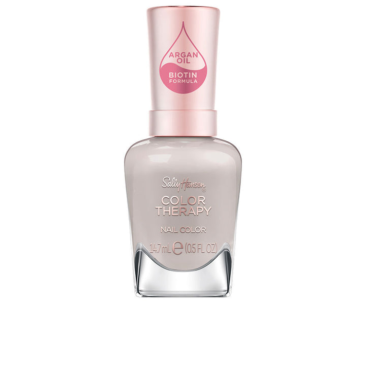 Bottle of beige Serenity Stone nail polish with argan oil, 14.7 ml