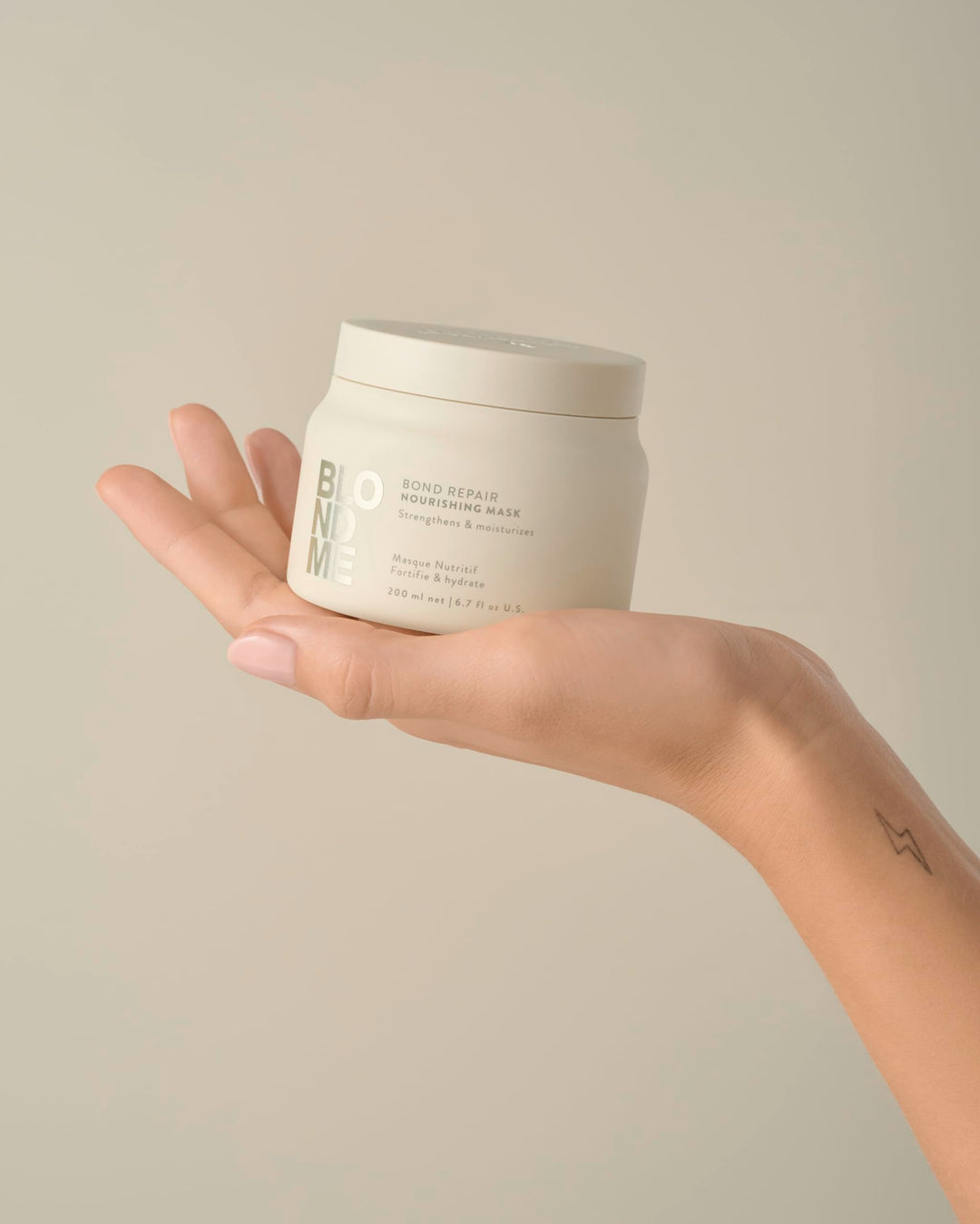 500 ml tub of rich repair hair mask for normal to coarse blonde hair