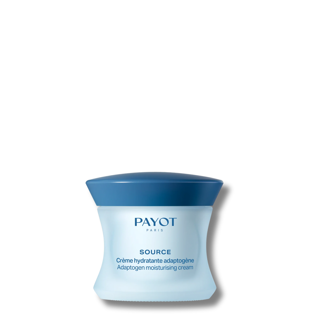 Payot moisturizing cream in a round glass jar with white lid, smooth pale cream visible inside.