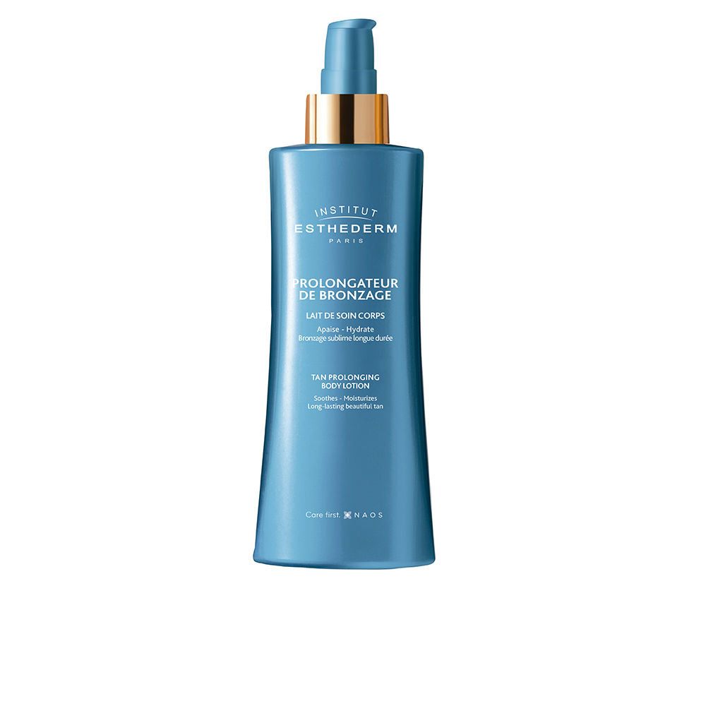 Blue plastic body lotion bottle with pump dispenser and gold collar, sleek modern profile, Institut Esthederm
