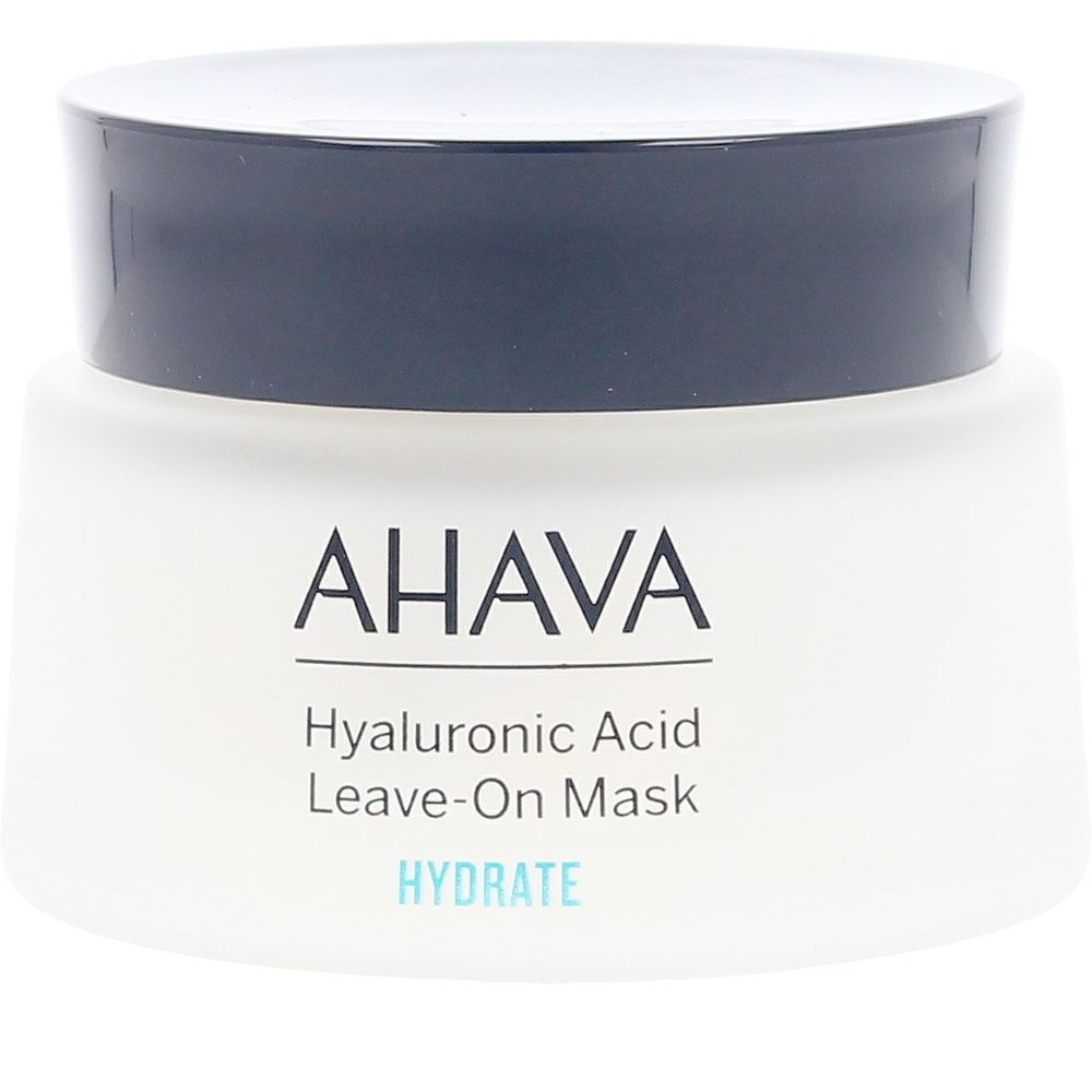 White cylindrical plastic jar with matte finish, black screw-on lid, printed text on front, Ahava
