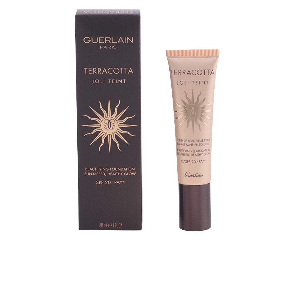 Glass bottle of terracotta liquid foundation, warm golden shade, 30 ml