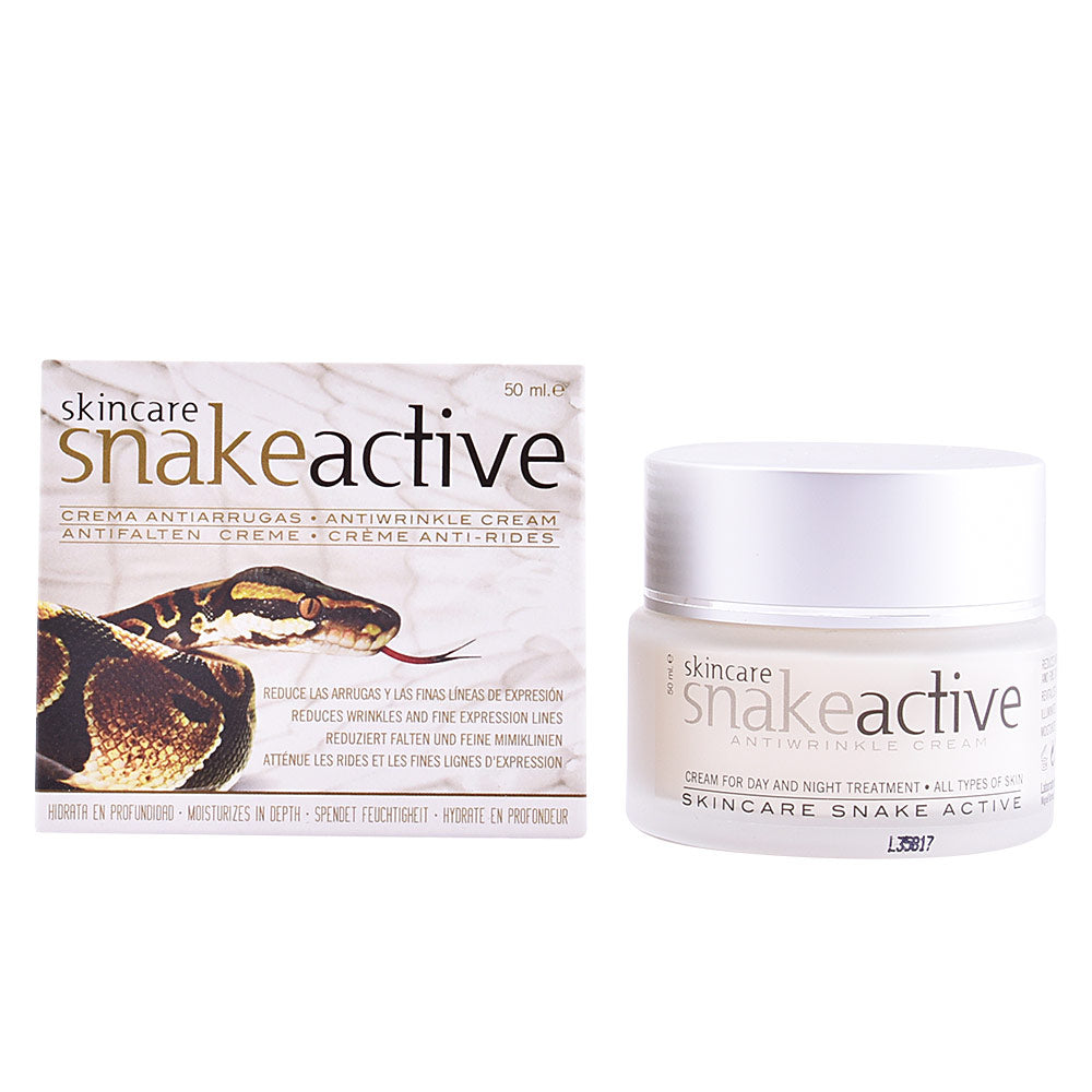 Diet Esthetic White plastic jar with gold screw lid, black box featuring snake motif, clean minimalistic presentation