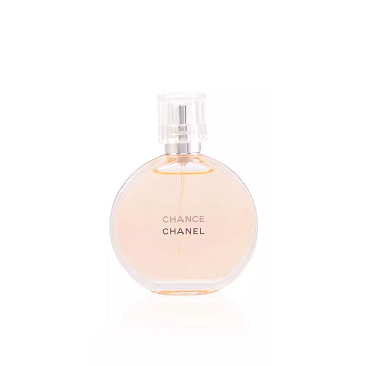Round glass bottle of chipre-floral Eau de Toilette, 35 ml, pale golden liquid