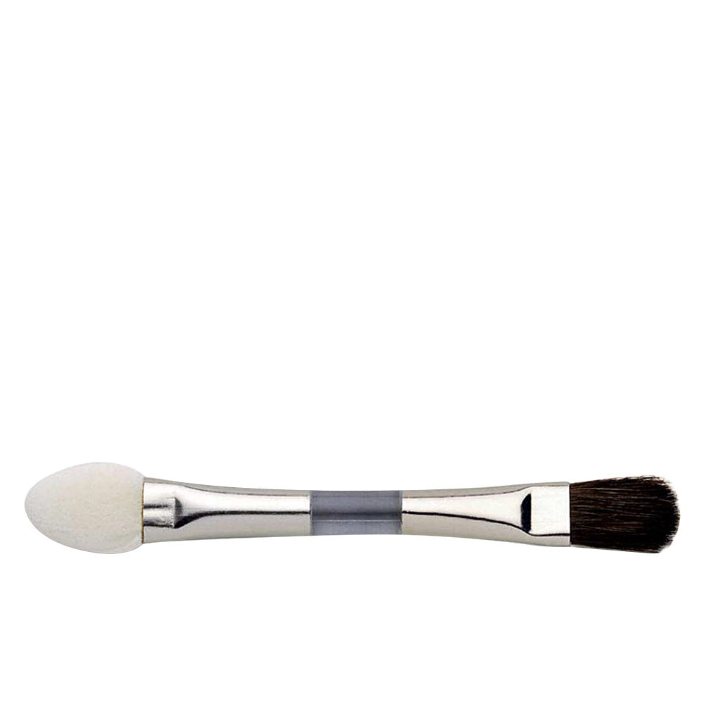 Artdeco Double-ended makeup applicator with foam tip and synthetic brush, metallic handle and transparent middle section.