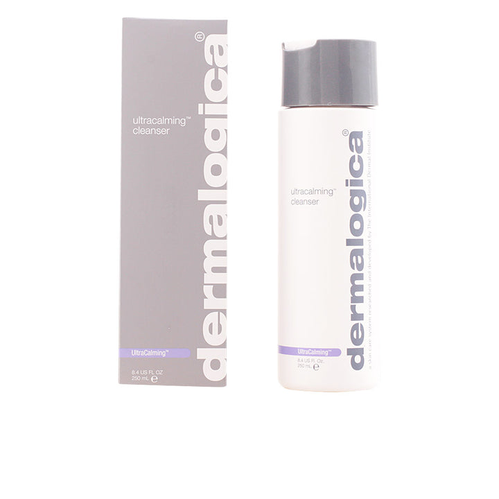Minimalist white plastic cleanser bottle with flip cap, rectangular gray box, purple accent strip, Dermalogica