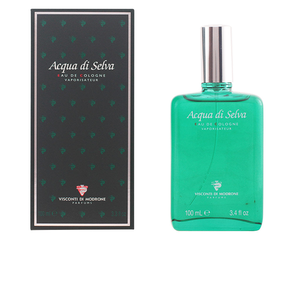 Victor Green glass rectangular eau de cologne bottle with silver cylindrical cap and printed text, matching box pattern