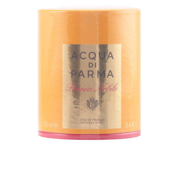 Clear crystal bottle with pale-rose perfume and rose-gold cap, 100 ml