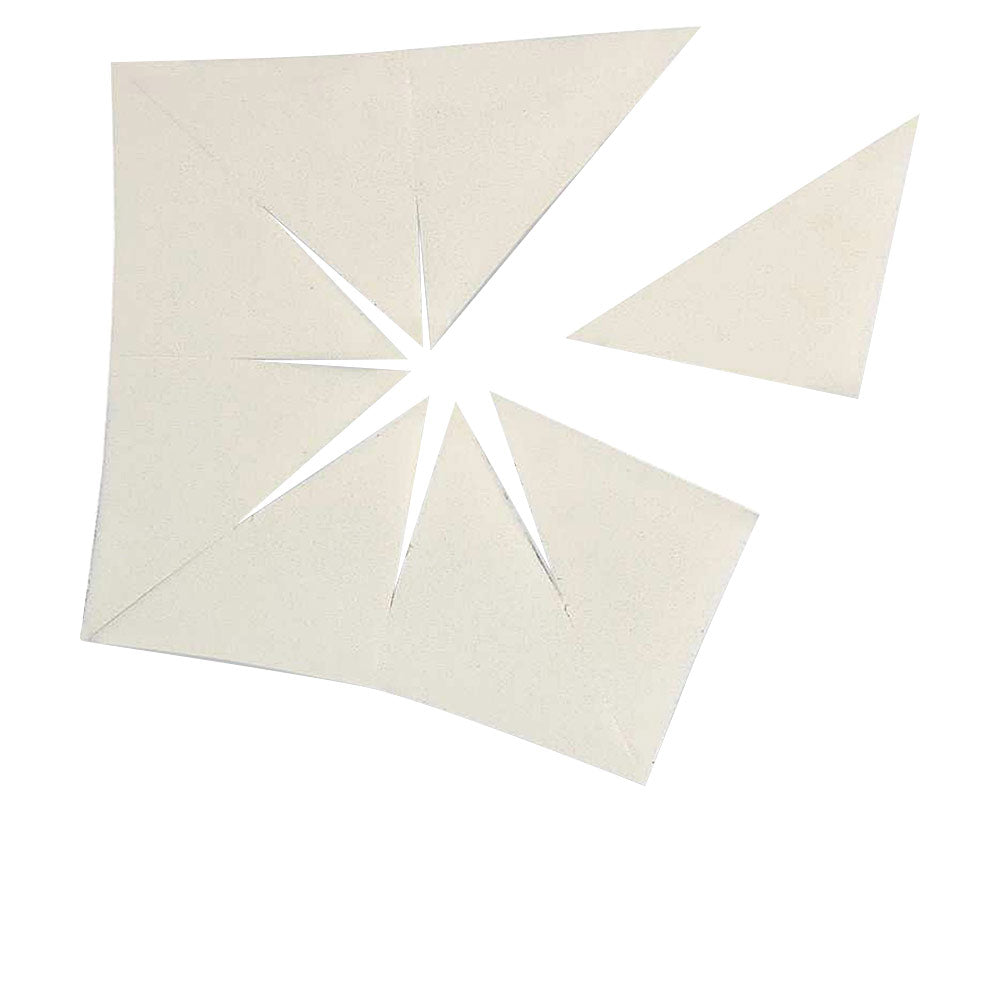 Artdeco Off-white paper contour sponge with irregular star-shaped cutout and triangular cut pieces, flat surface