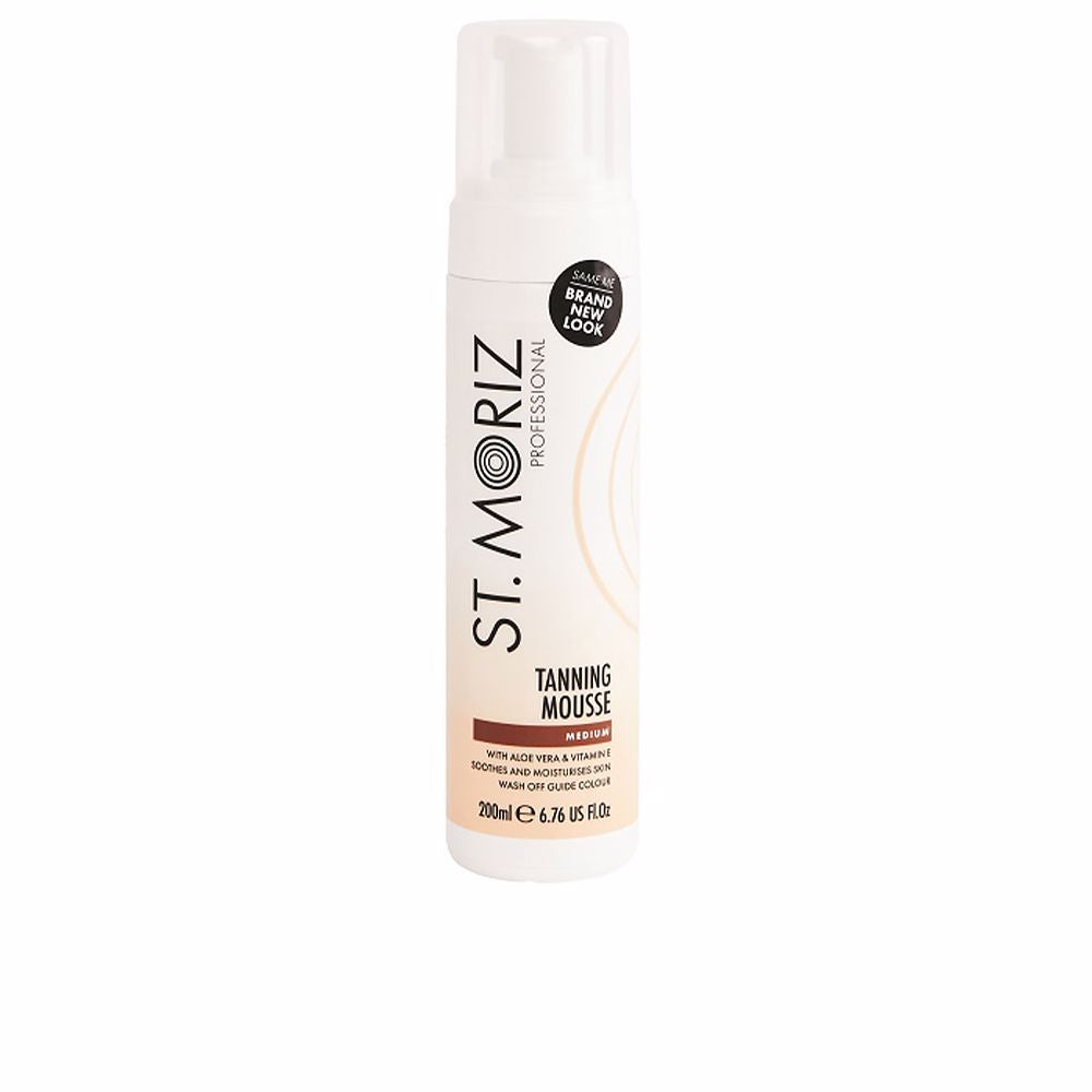 St. Moriz White plastic cylindrical tanning mousse bottle with pump dispenser, beige and black label, circular 'BRAND NEW LOOK' badge