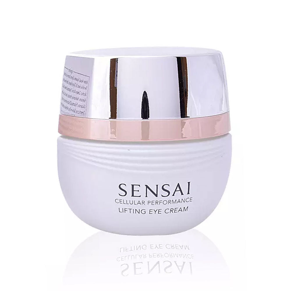 Jar of premium Sensai eye treatment cream beside soft cotton and leaves