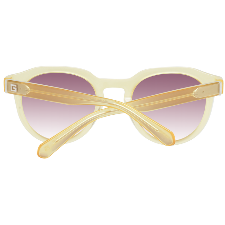 Yellow round sunglasses with purple gradient lenses and Guess logo on lens and temple