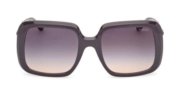 Dark purple oversized square sunglasses with gradient lenses and gold chain-link detail on temples