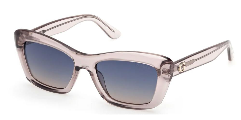 Transparent smoky gray rectangular sunglasses with blue gradient lenses and gold G temples on white background
