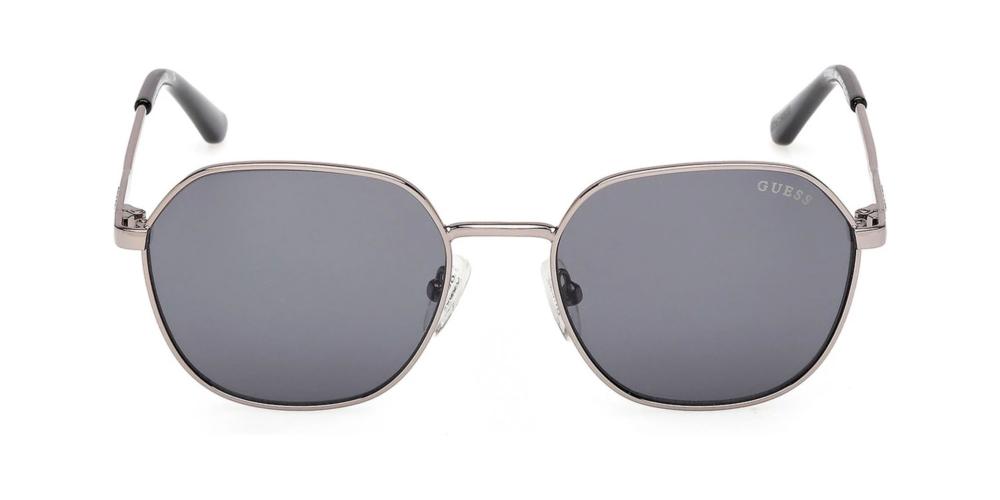 Unisex silver hexagonal sunglasses, dark gray lenses, thin metal frame, black temple tips, branded temples
