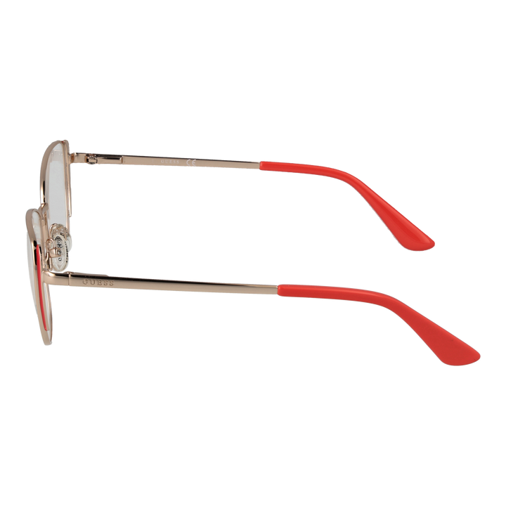 Gold metal cat-eye eyeglasses with coral temple tips, thin temples and adjustable nose pads on white background