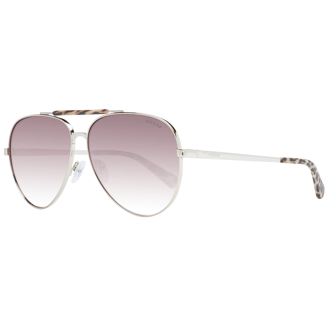 Silver aviator sunglasses with purple gradient lenses and tortoiseshell top bar and temple tips on white background