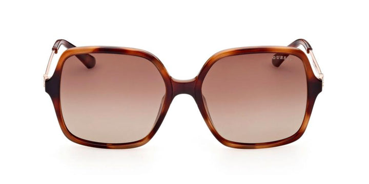 Brown oversized square sunglasses with gradient lenses and metal temples, plastic temple tips, shown at three-quarter angle